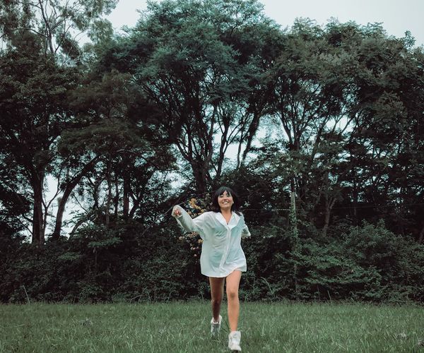 Person feeling energized and happy outdoors